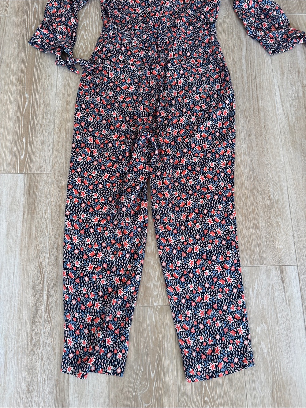 Floral V-Neck Long Sleeve Jumpsuit in Navy with Coral Accents - Picture 16 of 16